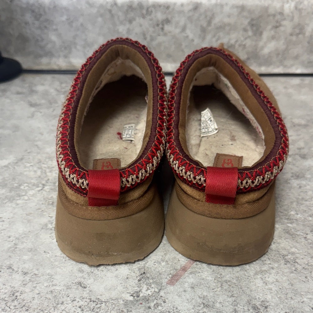 UGG Brown Suede Slip-Ons with Red Accents - Picture 2 of 8